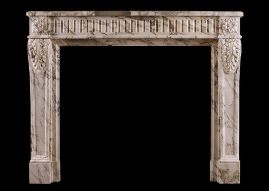 A French Louis XVI fireplace in Serravezza Breccia marble