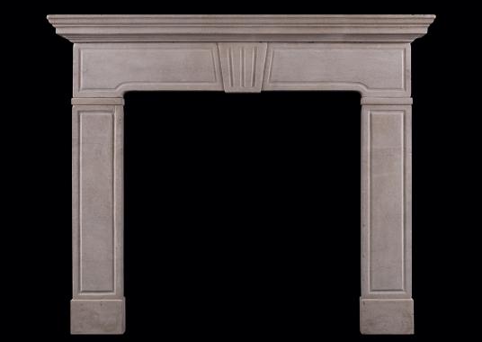 A late Regency style limestone fireplace