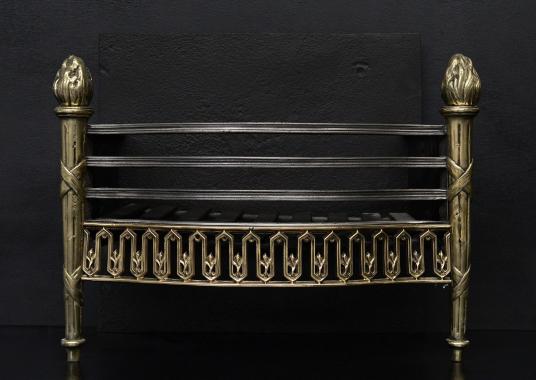 A polished brass and steel firegrate