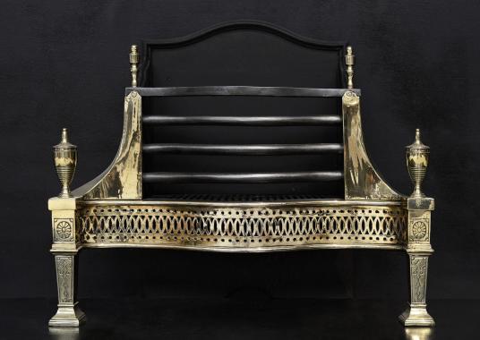 An English brass and steel firegrate in the George III style