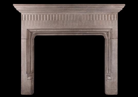 An English stone fireplace in the Gothic style