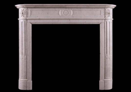 A French marble fireplace in Carrara marble