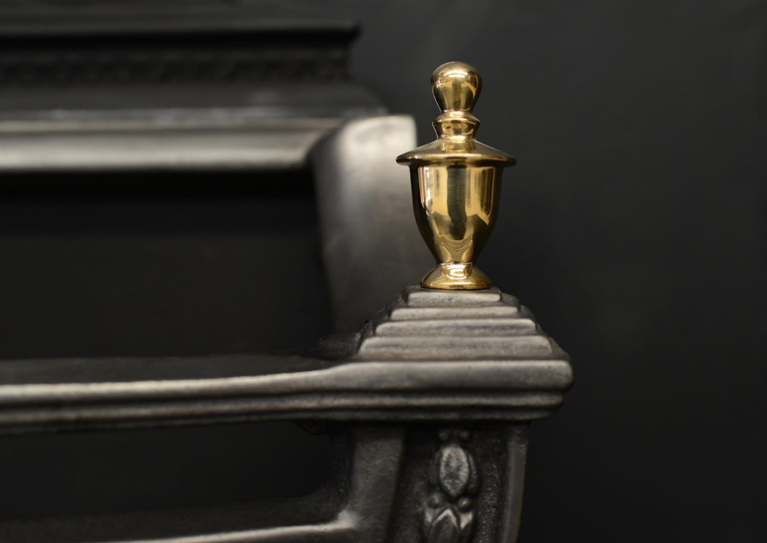 A polished cast iron Adam style basket